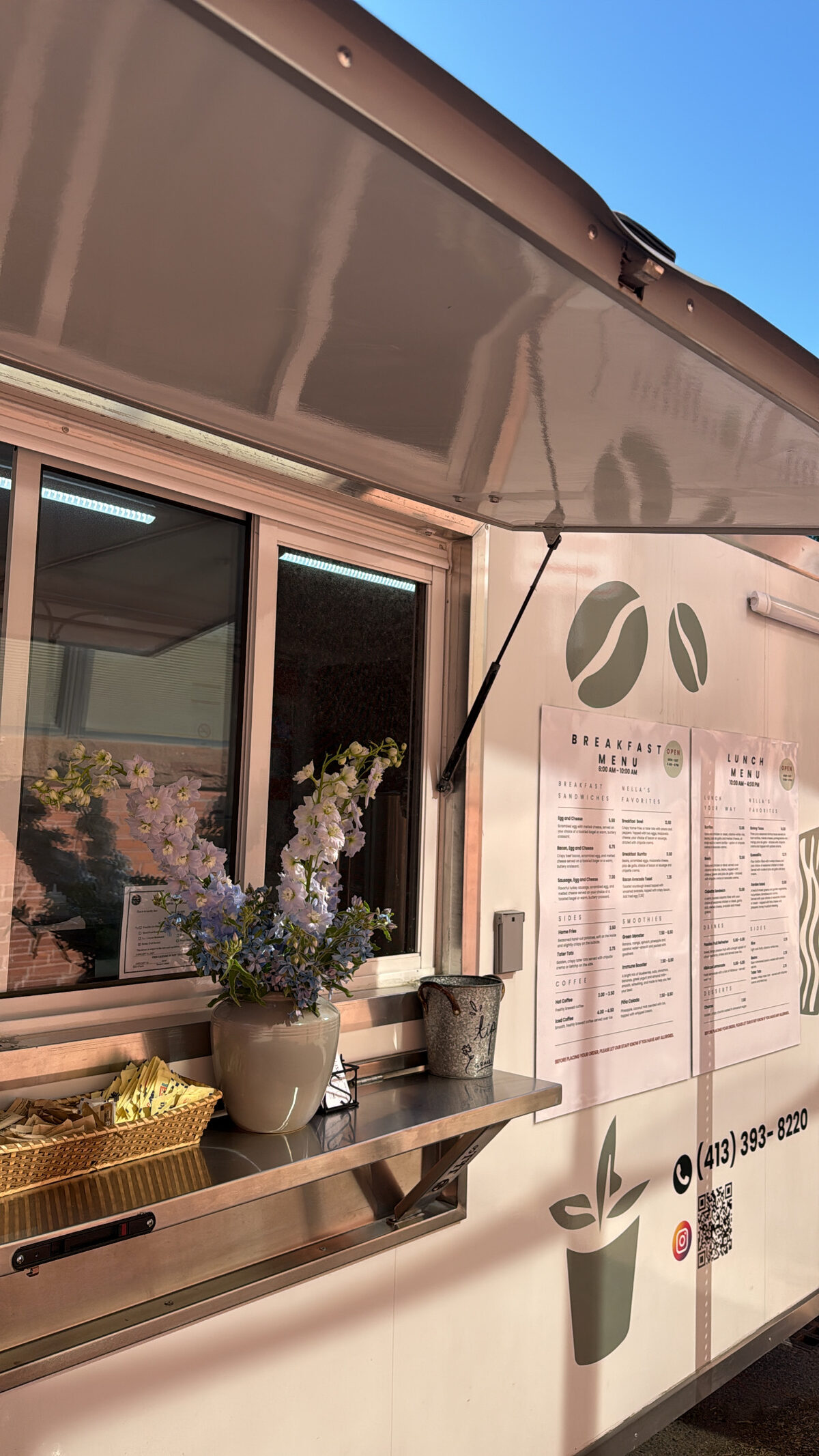 The service window with fresh flowers on the counter